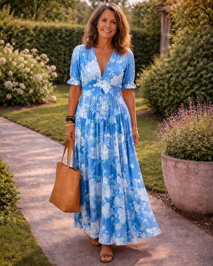 Ione | Abito Midi Floreale Senza Maniche con Scollo a V